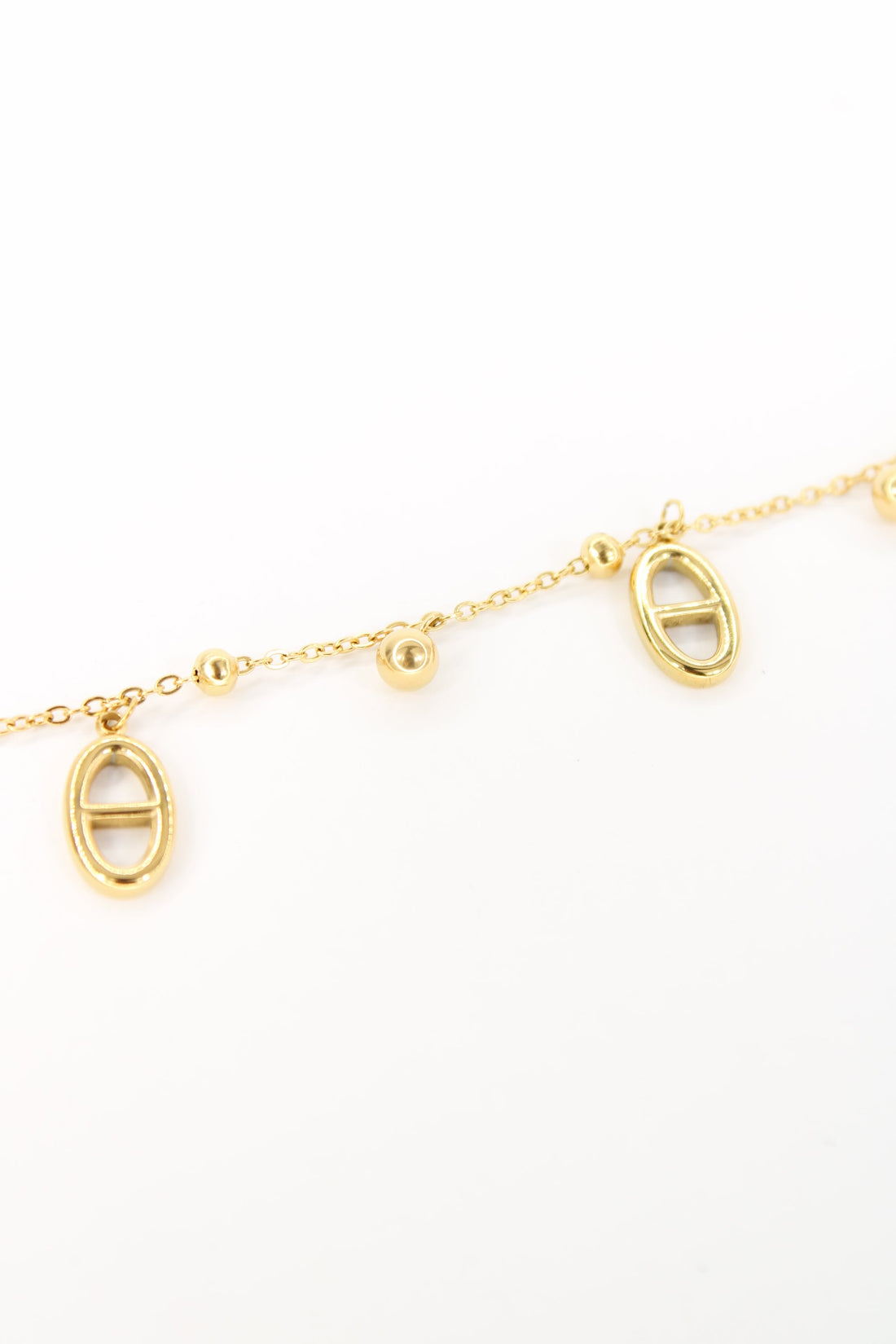 Chaîne de cheville Maty – Bijou doré minimaliste à pendentifs ovales